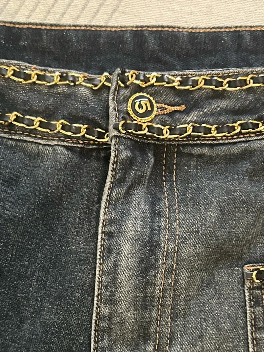 CHANEL Dark Blue Denim Jeans with Gold Chain Trim